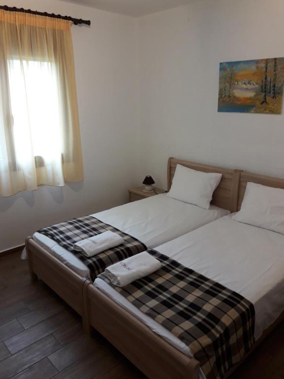 Postel nebo postele na pokoji v ubytování Konaki Guesthouse