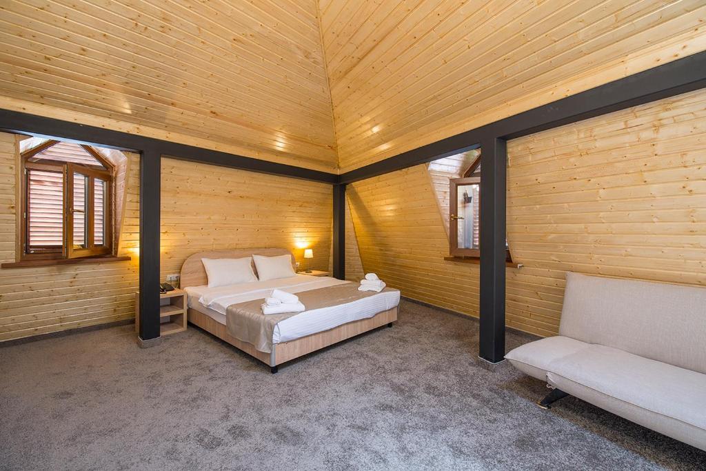 Postel nebo postele na pokoji v ubytování Hotel Opinion