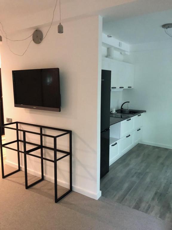 TV a/nebo společenská místnost v ubytování StanGret Hotel