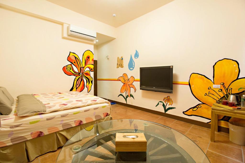 TV a/nebo společenská místnost v ubytování Sen Yun Chuang Yuan Homestay NO1249