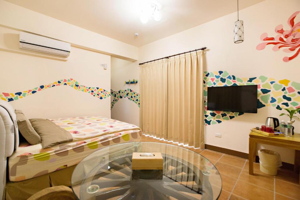 TV a/nebo společenská místnost v ubytování Sen Yun Chuang Yuan Homestay NO1249