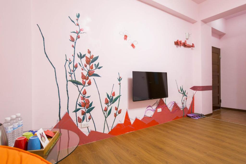 TV a/nebo společenská místnost v ubytování Sen Yun Chuang Yuan Homestay NO1249