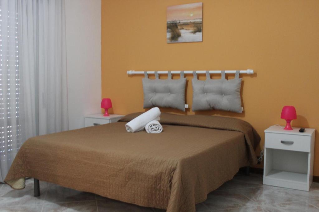 Posteľ alebo postele v izbe v ubytovaní Casa Chiarenza