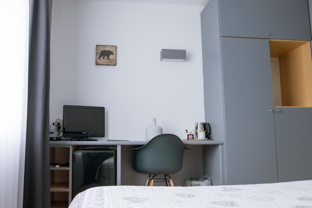 Postel nebo postele na pokoji v ubytování Hotel De Fierlant