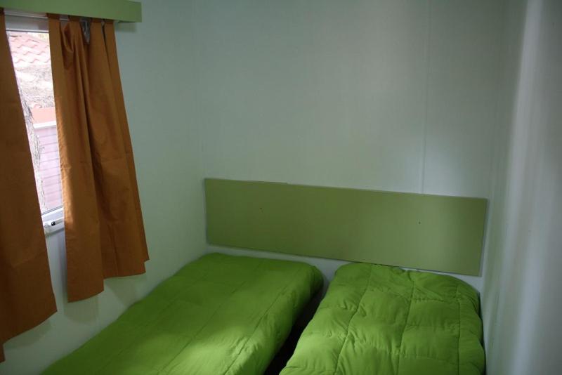 Postel nebo postele na pokoji v ubytování Camping Santamarta