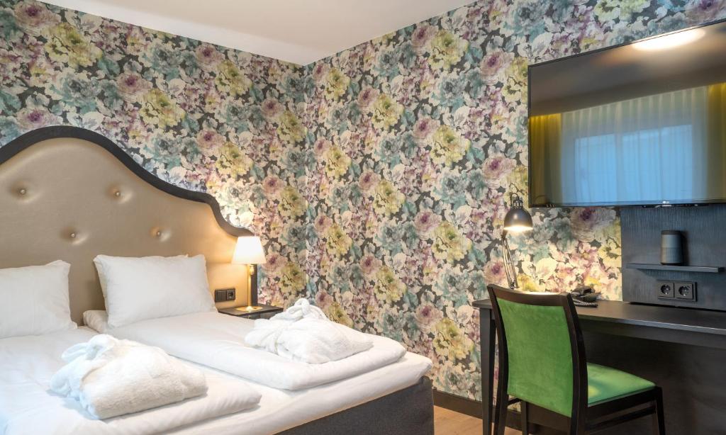 Postel nebo postele na pokoji v ubytování Thon Hotel Cecil