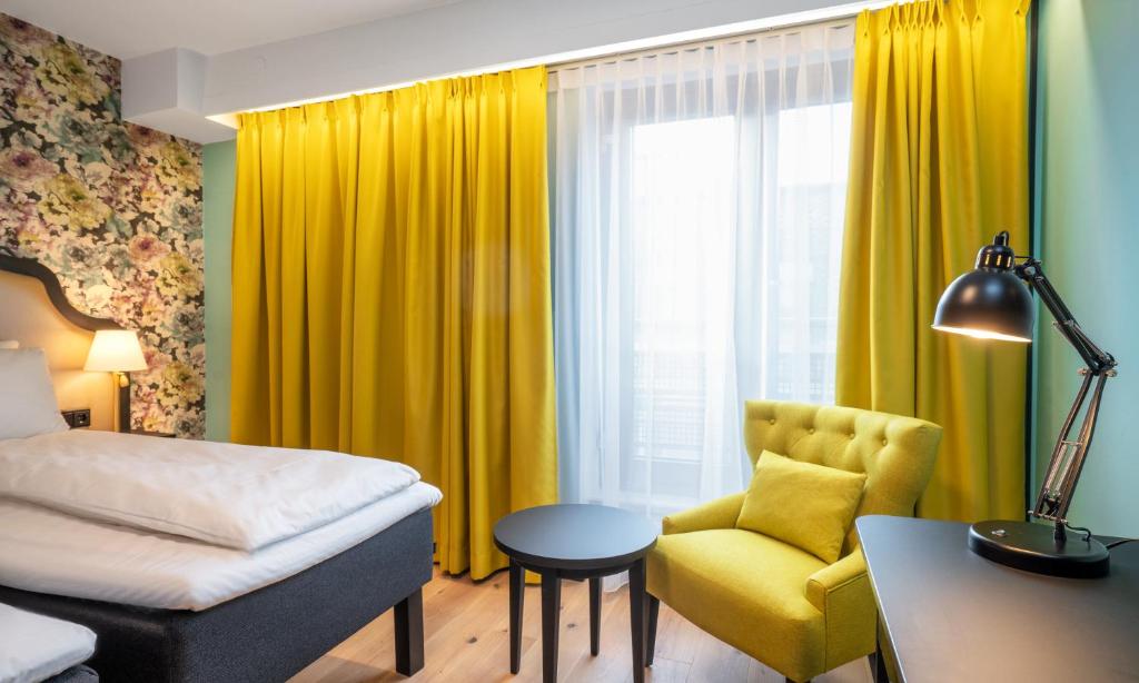 Postel nebo postele na pokoji v ubytování Thon Hotel Cecil