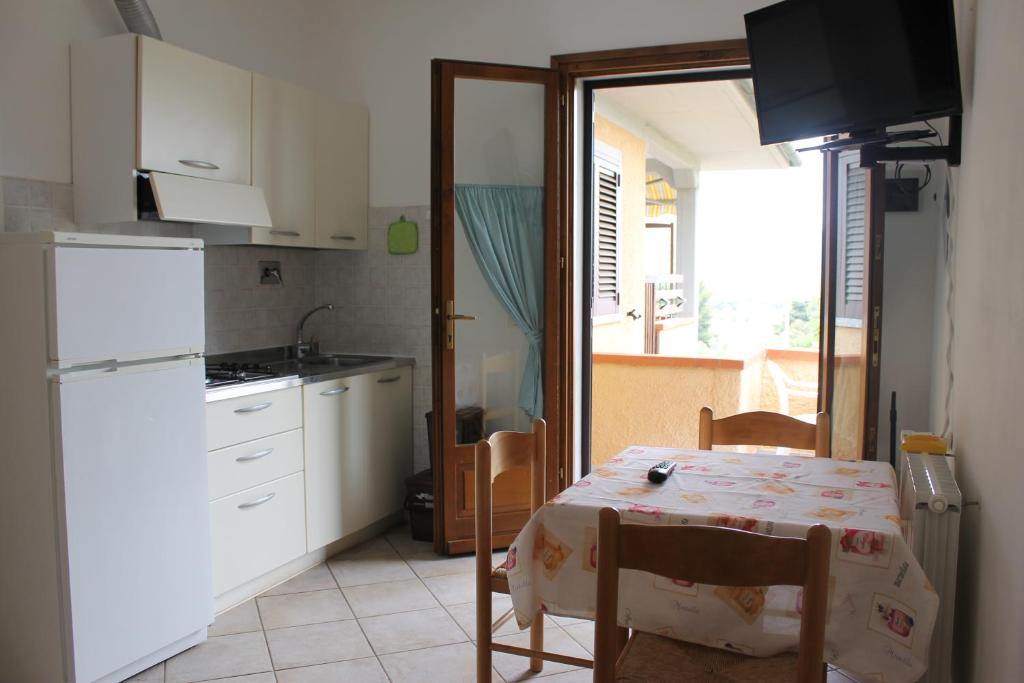Kuchyň nebo kuchyňský kout v ubytování Residence Alithai