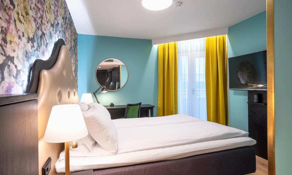 Postel nebo postele na pokoji v ubytování Thon Hotel Cecil