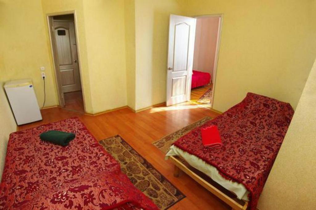 Postel nebo postele na pokoji v ubytování HOTEL ЗiРКА