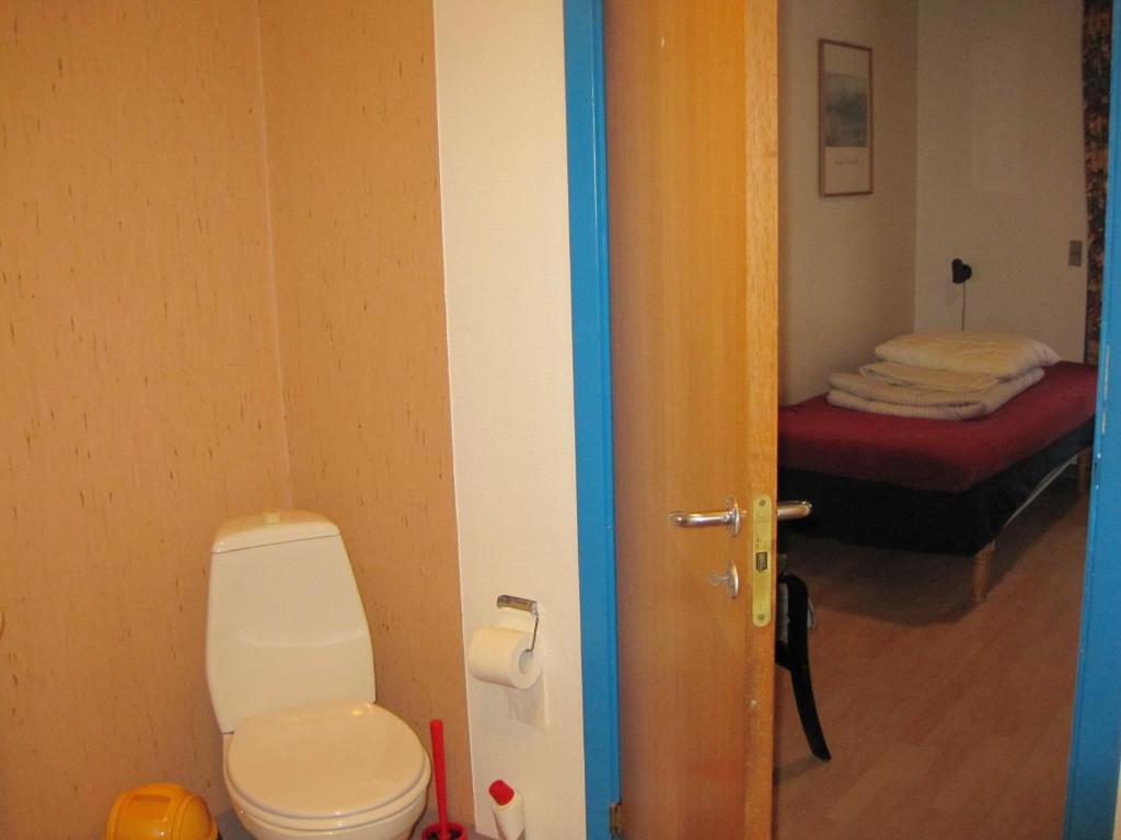 Postel nebo postele na pokoji v ubytování Silkeborg Sø Camping Apartments