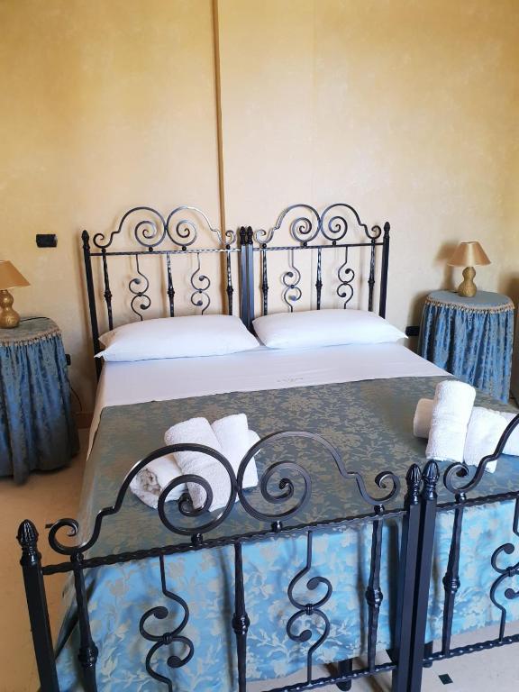 Postel nebo postele na pokoji v ubytování Villa Belvedere di Rita