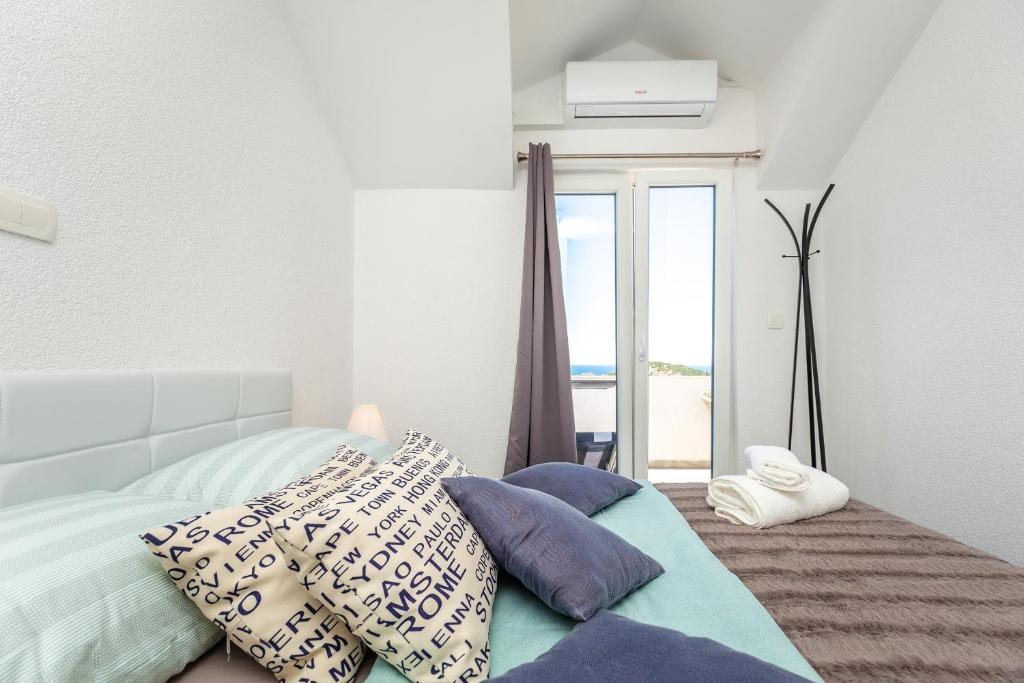 Postel nebo postele na pokoji v ubytování Apartment Horizon