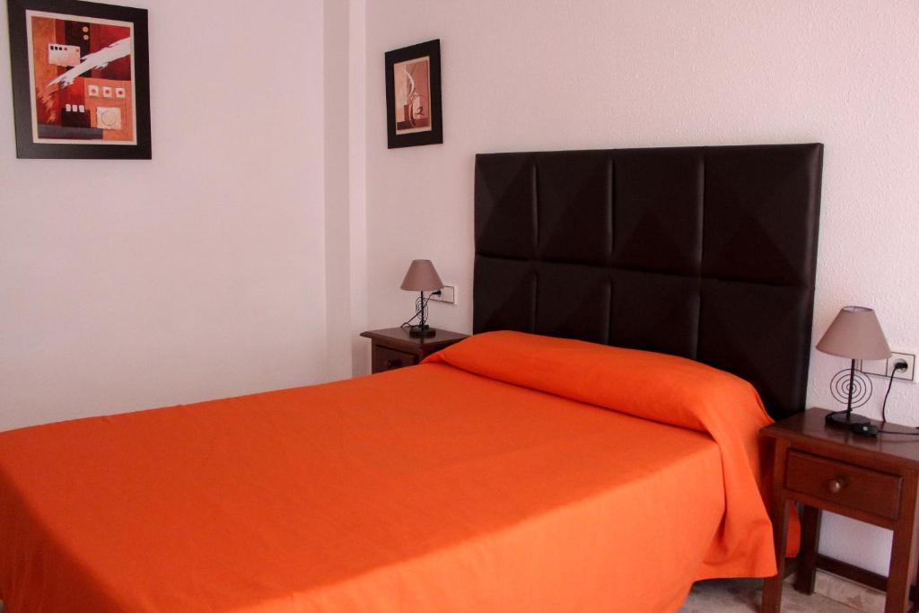 Postel nebo postele na pokoji v ubytování Hostal Esperanza