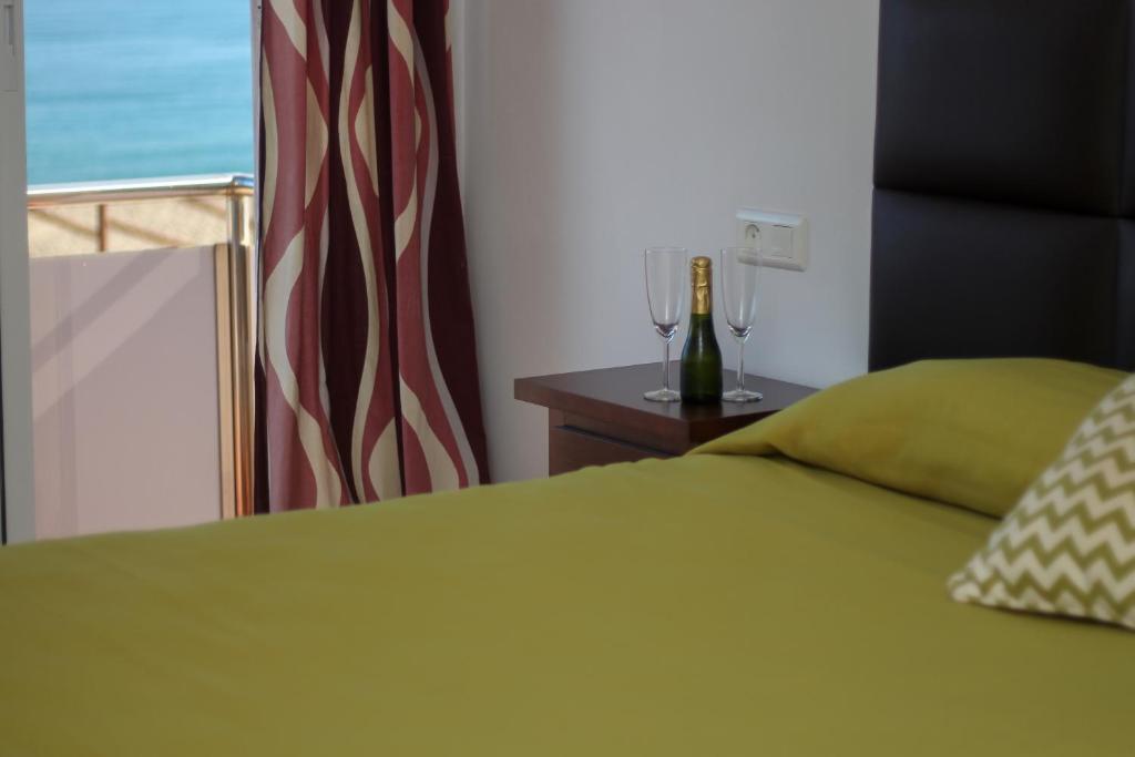 Postel nebo postele na pokoji v ubytování Hostal Esperanza