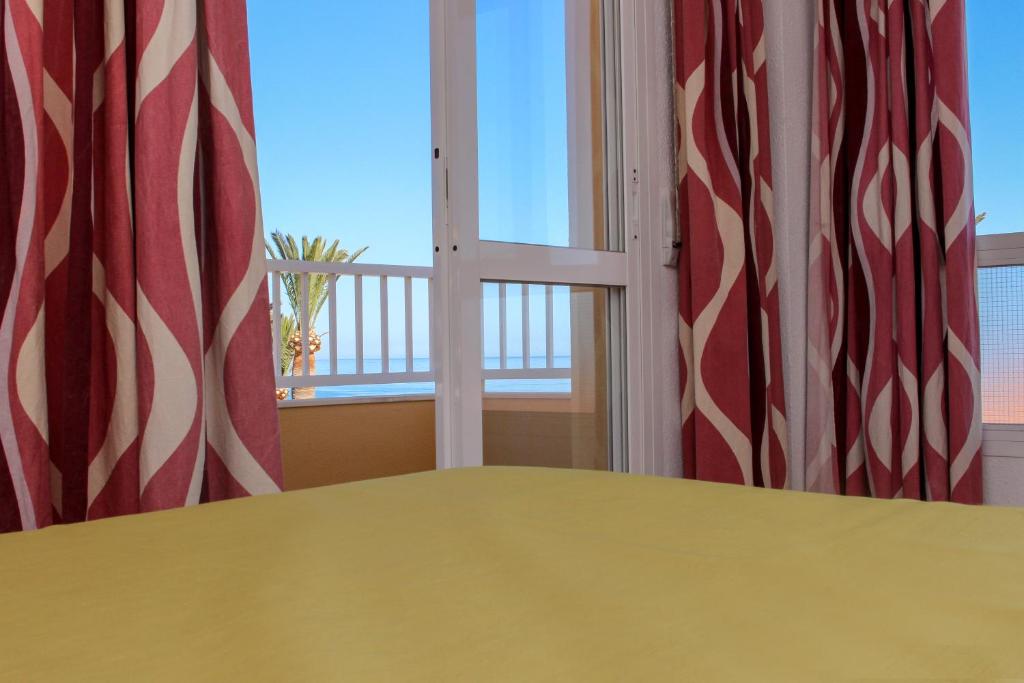 Postel nebo postele na pokoji v ubytování Hostal Esperanza