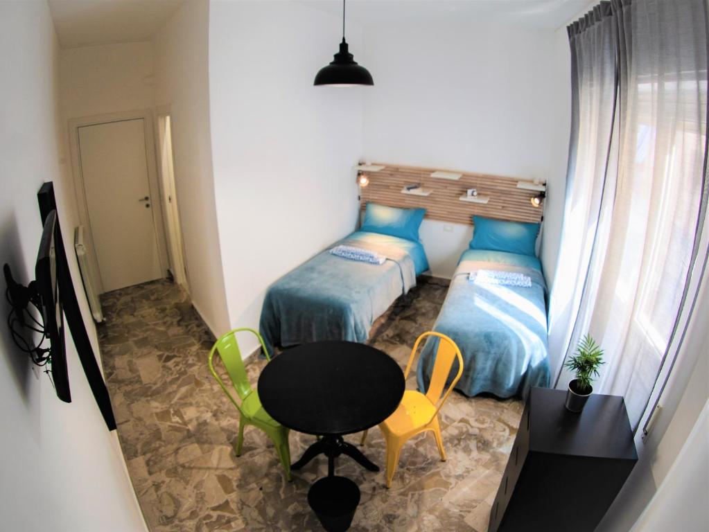 Posteľ alebo postele v izbe v ubytovaní Be Central Rooms