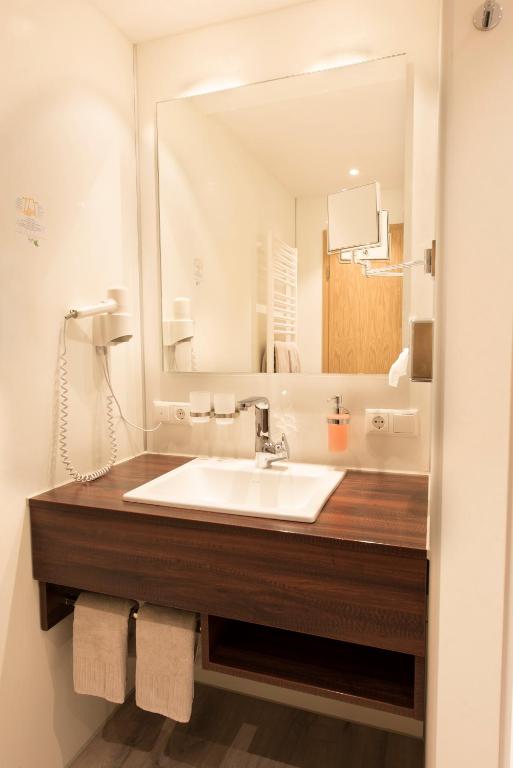 Koupelna v ubytování AKZENT Hotel Krone