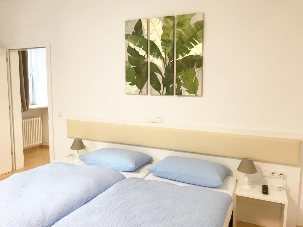 Postel nebo postele na pokoji v ubytování Manzoni Premium