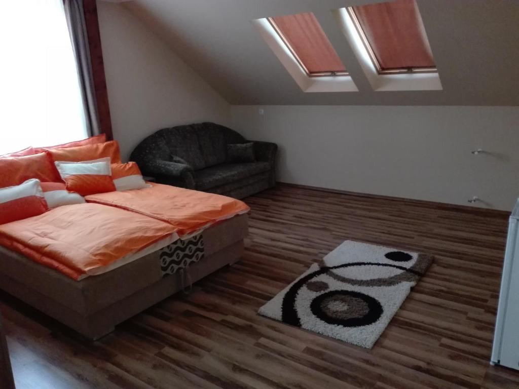 Postel nebo postele na pokoji v ubytování Rita Apartman