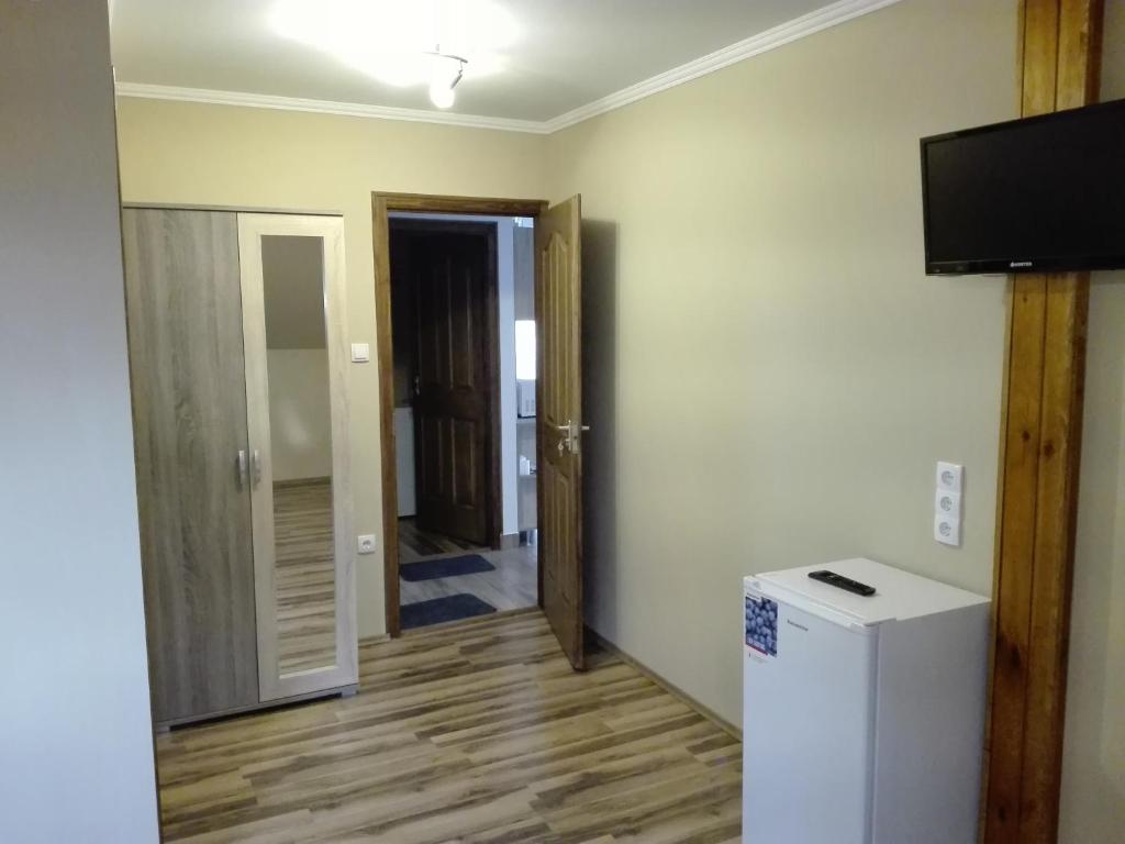 TV a/nebo společenská místnost v ubytování Rita Apartman