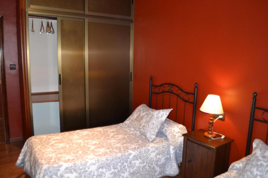 Posteľ alebo postele v izbe v ubytovaní Hostal Pension La Ruta