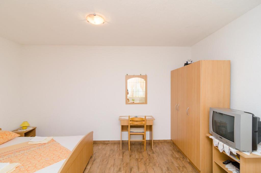Telewizja i/lub zestaw kina domowego w obiekcie Apartments Skurla