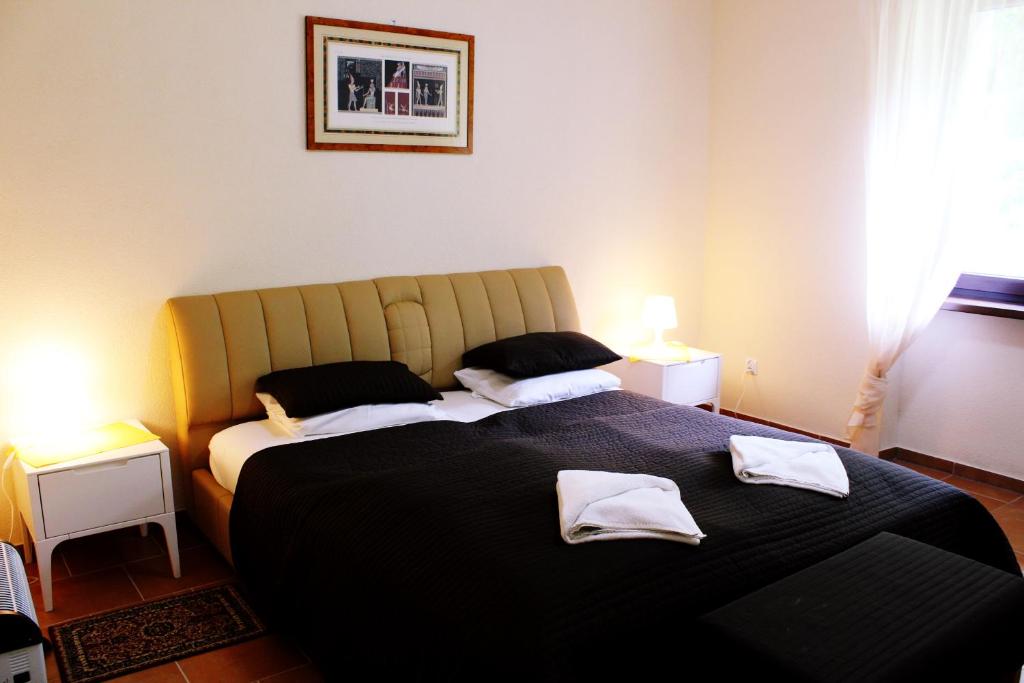 Postel nebo postele na pokoji v ubytování Złoty Potok Resort