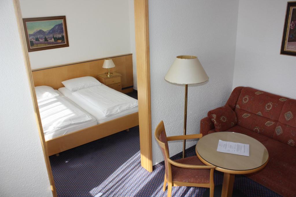 Postel nebo postele na pokoji v ubytování Parkhotel Styria
