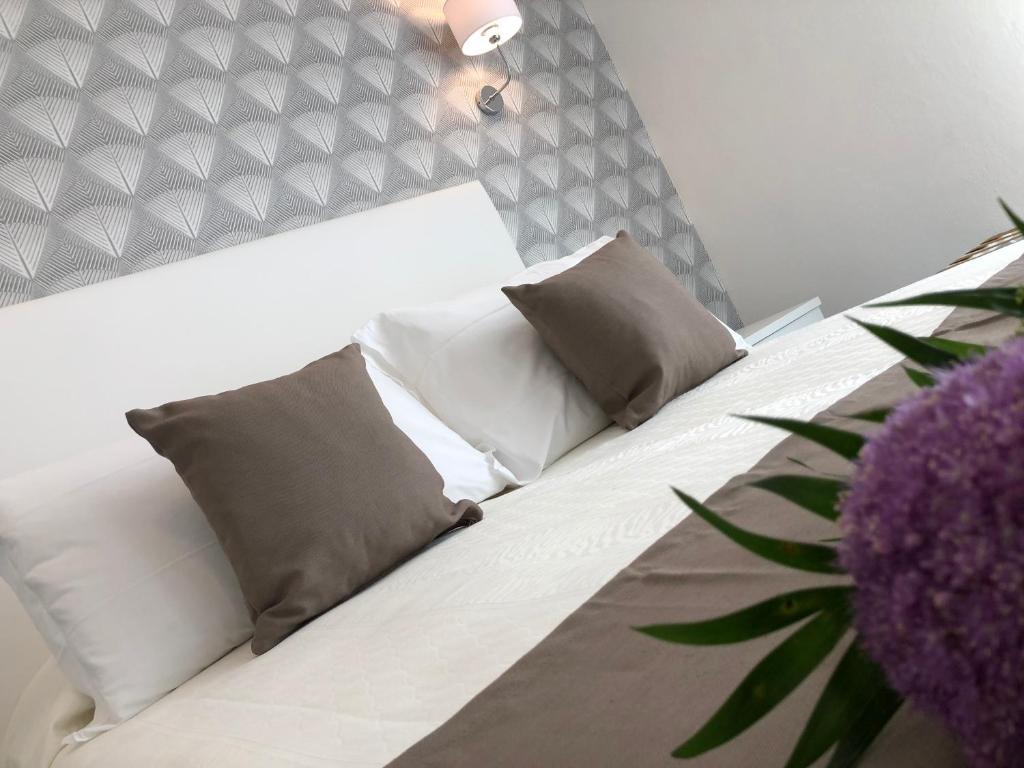Postel nebo postele na pokoji v ubytování Hotel Gorini