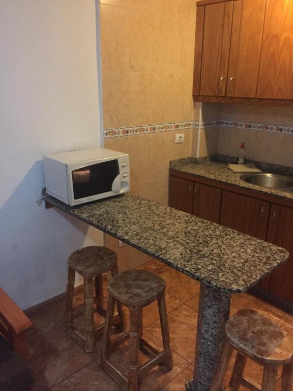 A kitchen or kitchenette at Apartment Yumbo Centrum