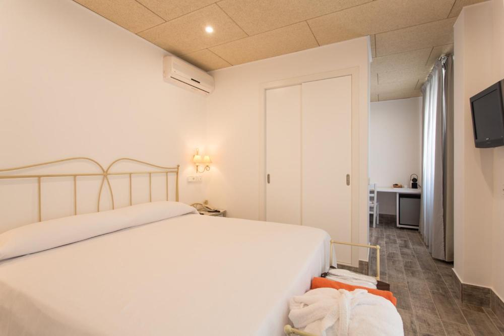 Postel nebo postele na pokoji v ubytování Hotel & Spa Entre Pinos-Adults Only