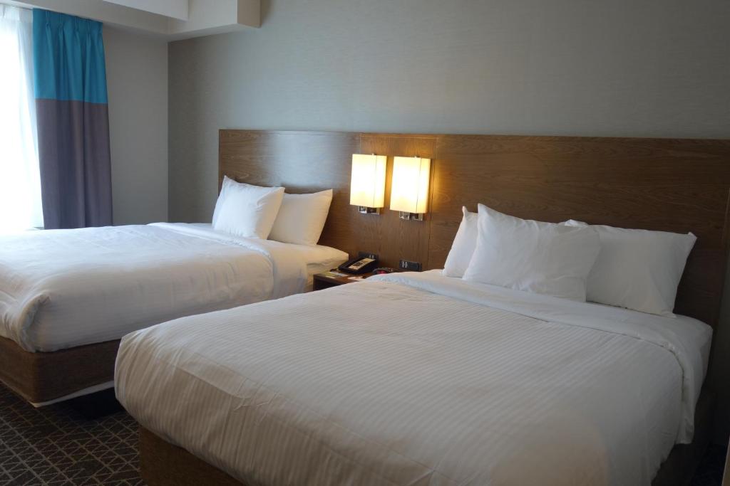 Postel nebo postele na pokoji v ubytování Park Inn by Radisson Brampton, ON