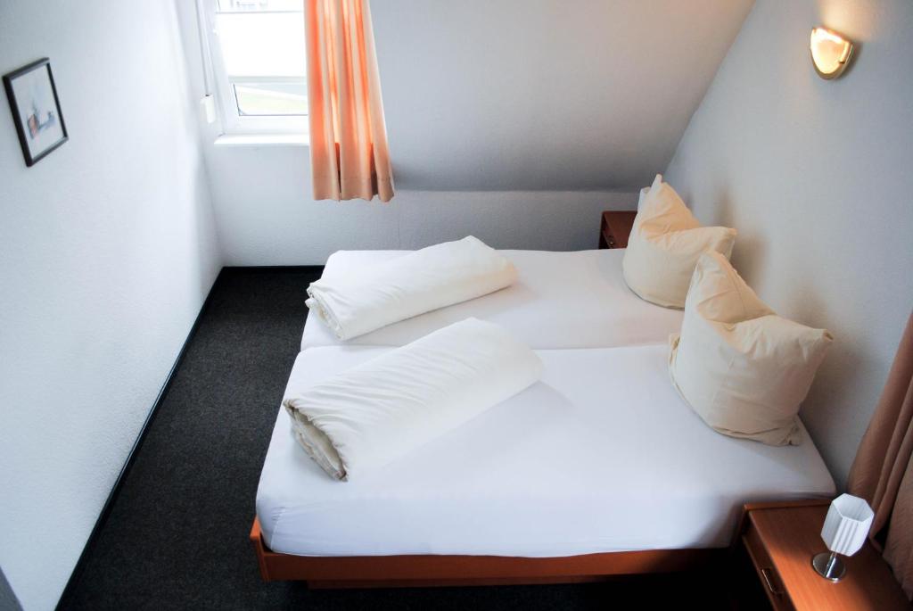 Postel nebo postele na pokoji v ubytování Gasthof Sauerwald