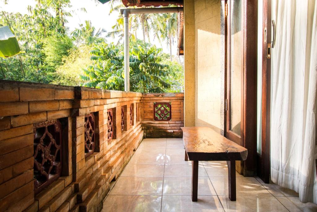 Balkón nebo terasa v ubytování Bali Asli Lodge by EPS