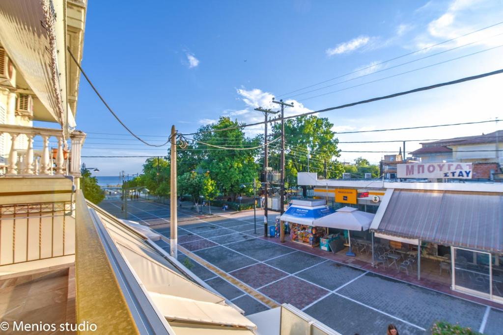 an overhead view of a street with a building at Menios Apartments and Studios in Nea Kalikratia