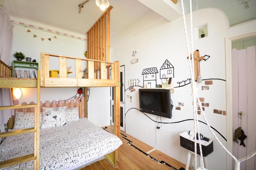 TV a/nebo společenská místnost v ubytování Sea House