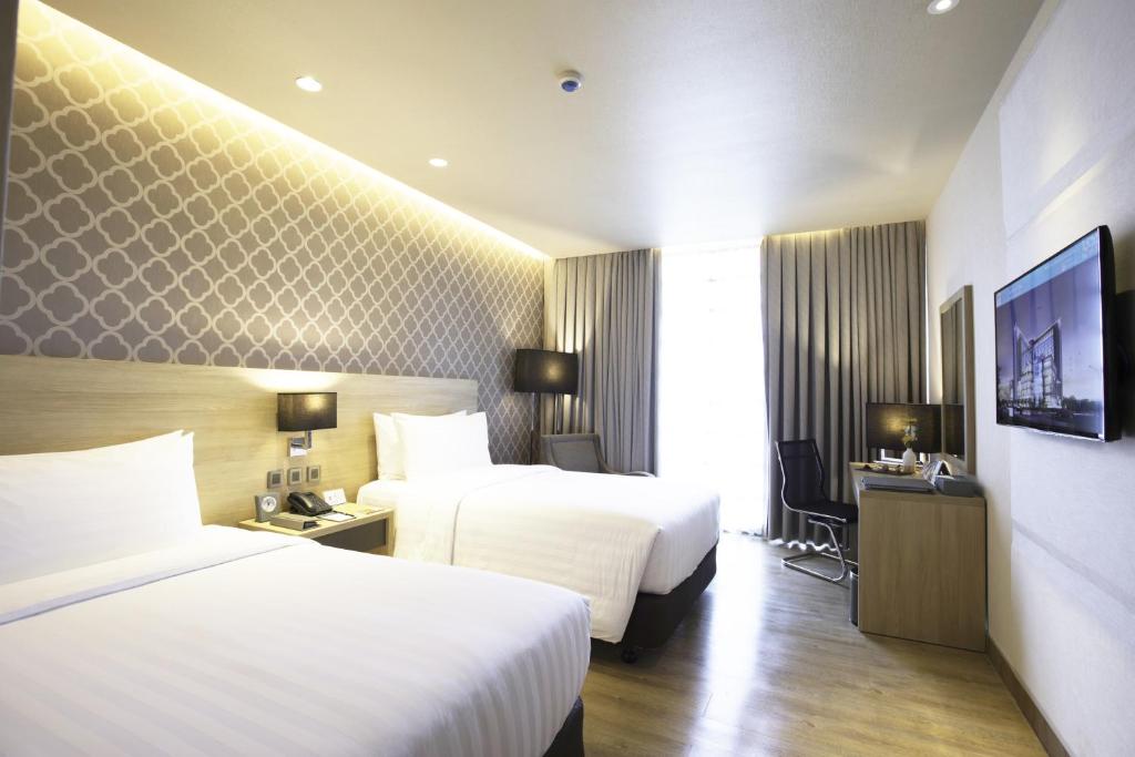bai Hotel Cebuにあるベッド