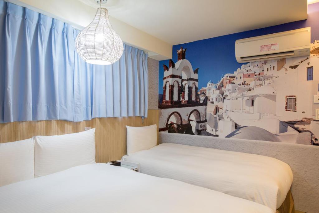 Postel nebo postele na pokoji v ubytování Morwing Hotel - Culture Vogue