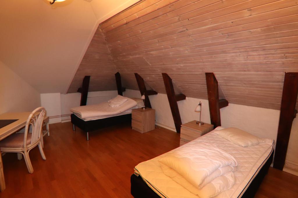 Postel nebo postele na pokoji v ubytování City HotelApartment