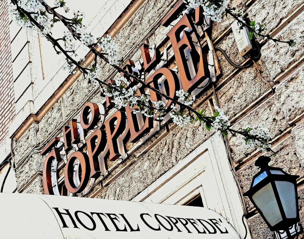 a hotel control sign on the side of a building at Hotel Coppede' in Rome
