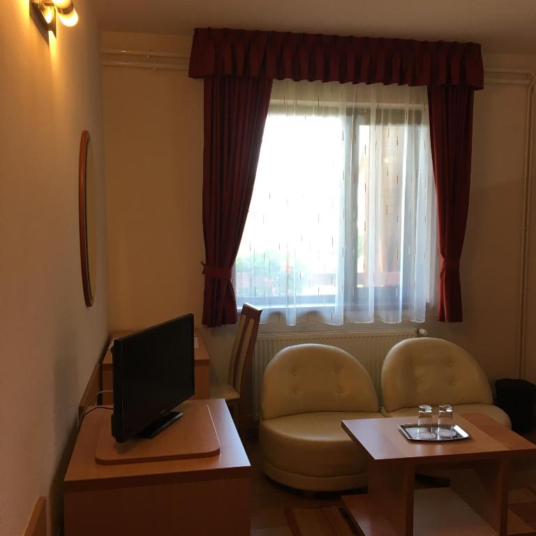 TV a/nebo společenská místnost v ubytování Motel Sora