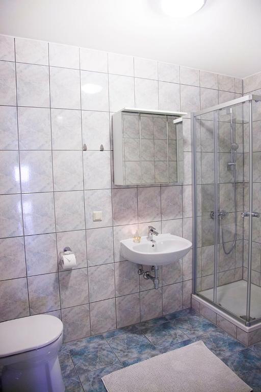Koupelna v ubytování Das Quartier