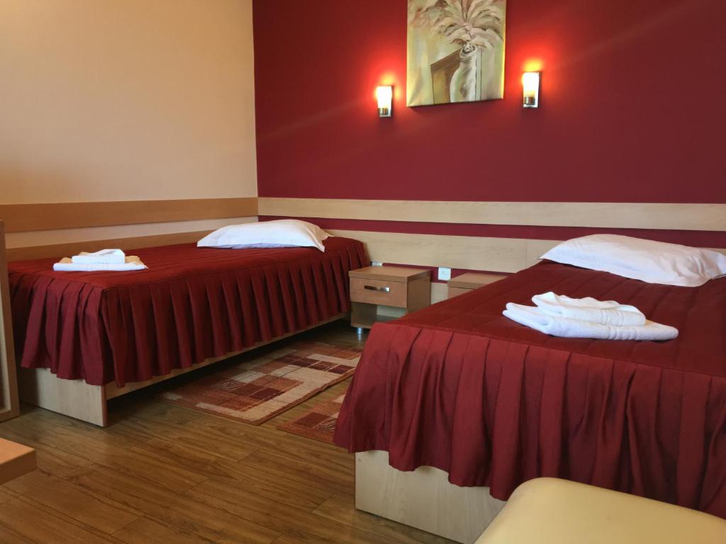 Postel nebo postele na pokoji v ubytování Motel Sora