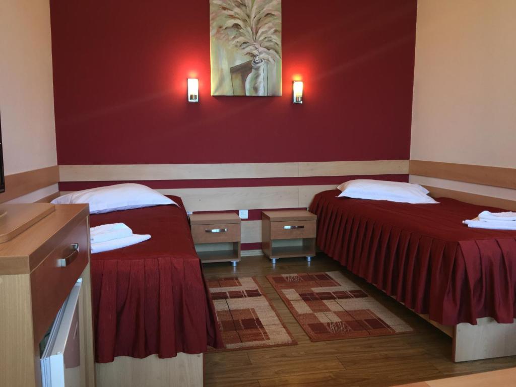 Postel nebo postele na pokoji v ubytování Motel Sora