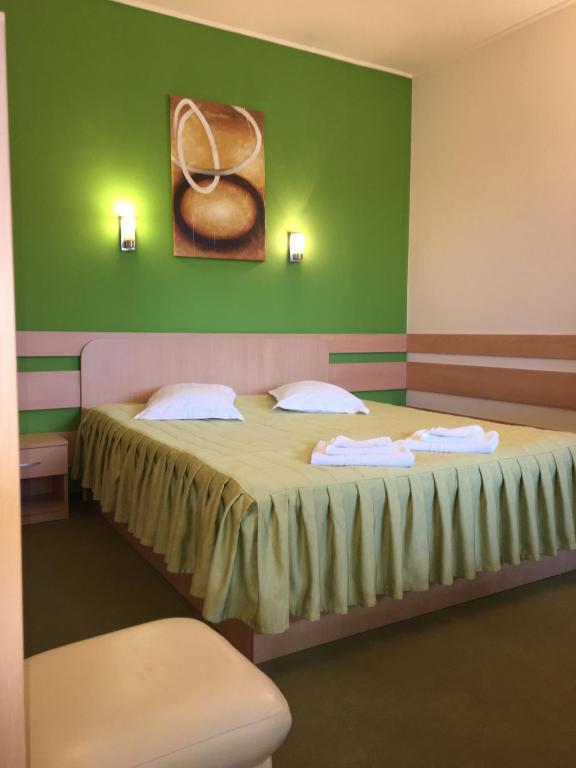 Postel nebo postele na pokoji v ubytování Motel Sora