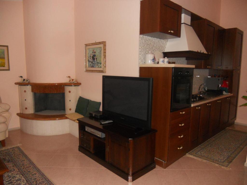 Kuchyň nebo kuchyňský kout v ubytování B&B Villa Lena