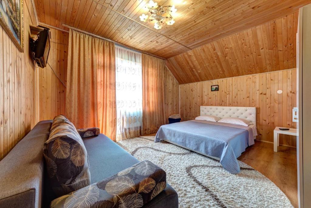 Postel nebo postele na pokoji v ubytování Guest House Velet