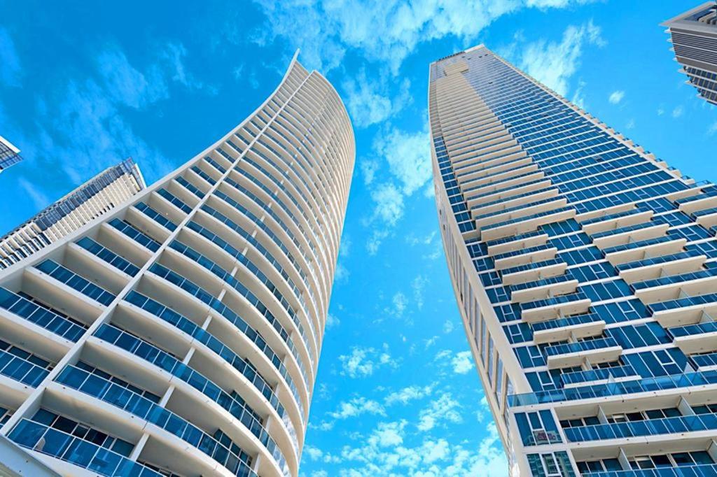 two tall buildings looking up at the sky at H Star Residences-- Paradise Stayz in Gold Coast