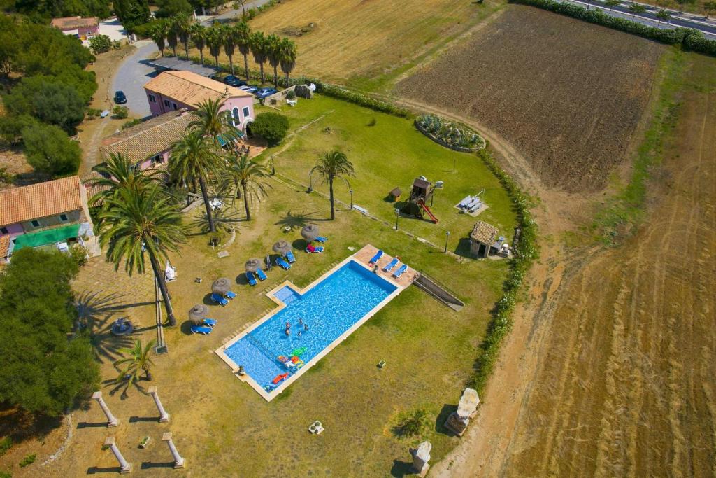 The swimming pool at or close to Rural Charm villa and Outdoor Adventure Agritourism Apartment with Private Mountain Path approximately 5 minutes walking from the beach Ideal for relaxation